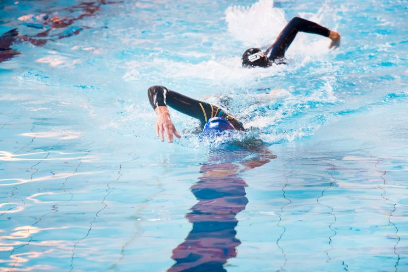 How to get more out of your swim kick by doing less