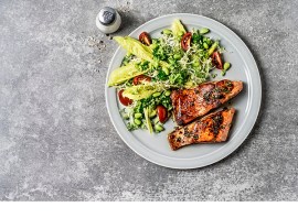 What is the Paleo diet, and is it suitable for a triathlete training for an Ironman?