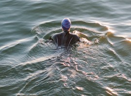 Can you swim breaststroke in an Ironman?