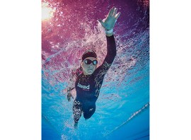 Why do I feel out of breath when I swim in a wetsuit?