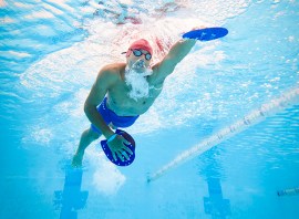 Swimming with paddles: a training session to develop power