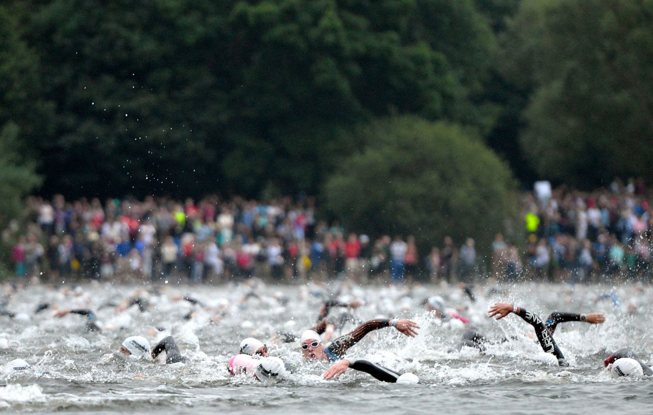 Athletes swimming at Ironman UK 2014