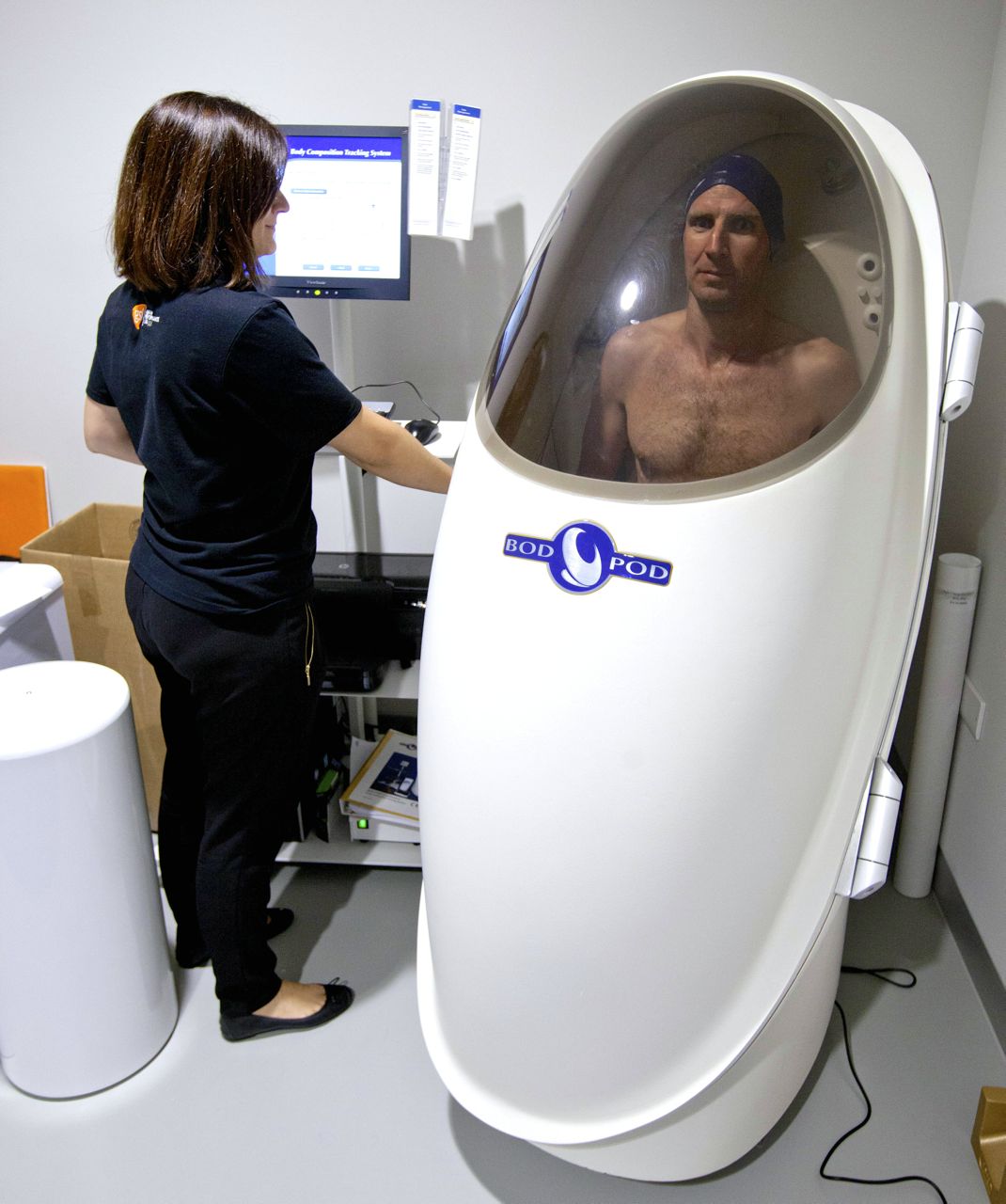 Tim Heming in GSK's body composition pod