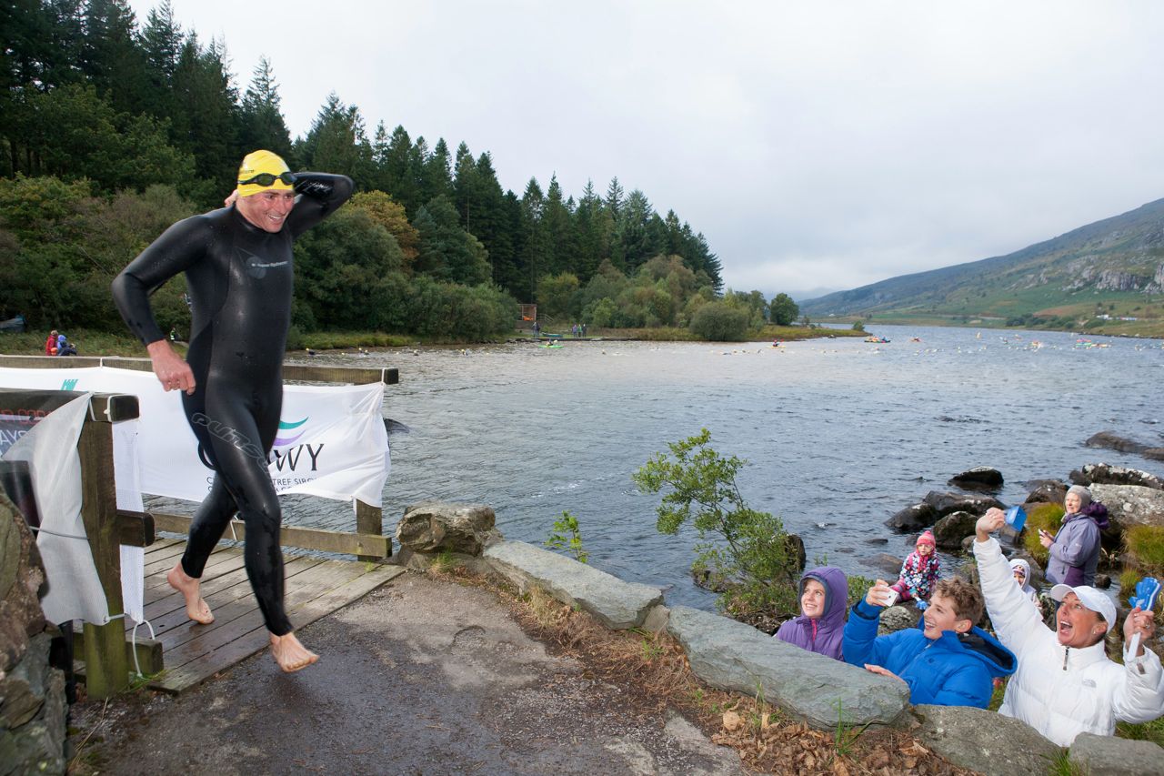 Swimmer reaching T1 at Snowman Triathlon 2013