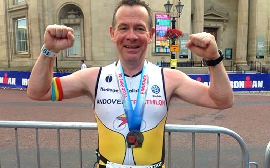 Peter Whent at the finish line of Ironman UK