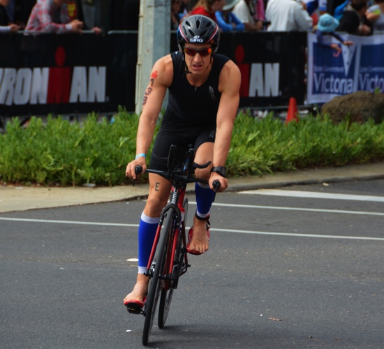 Tim Ballintine cycling in an Ironman race