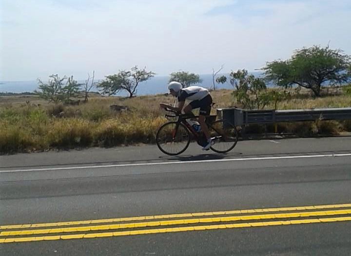 Triathlete in bike training on Kona race week