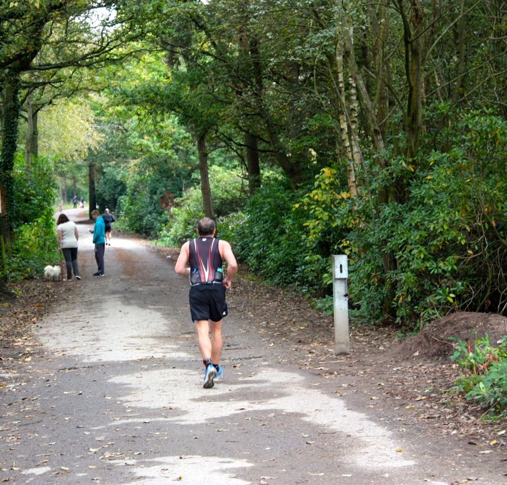 Runner competing in Huntsman Triathlon 2014