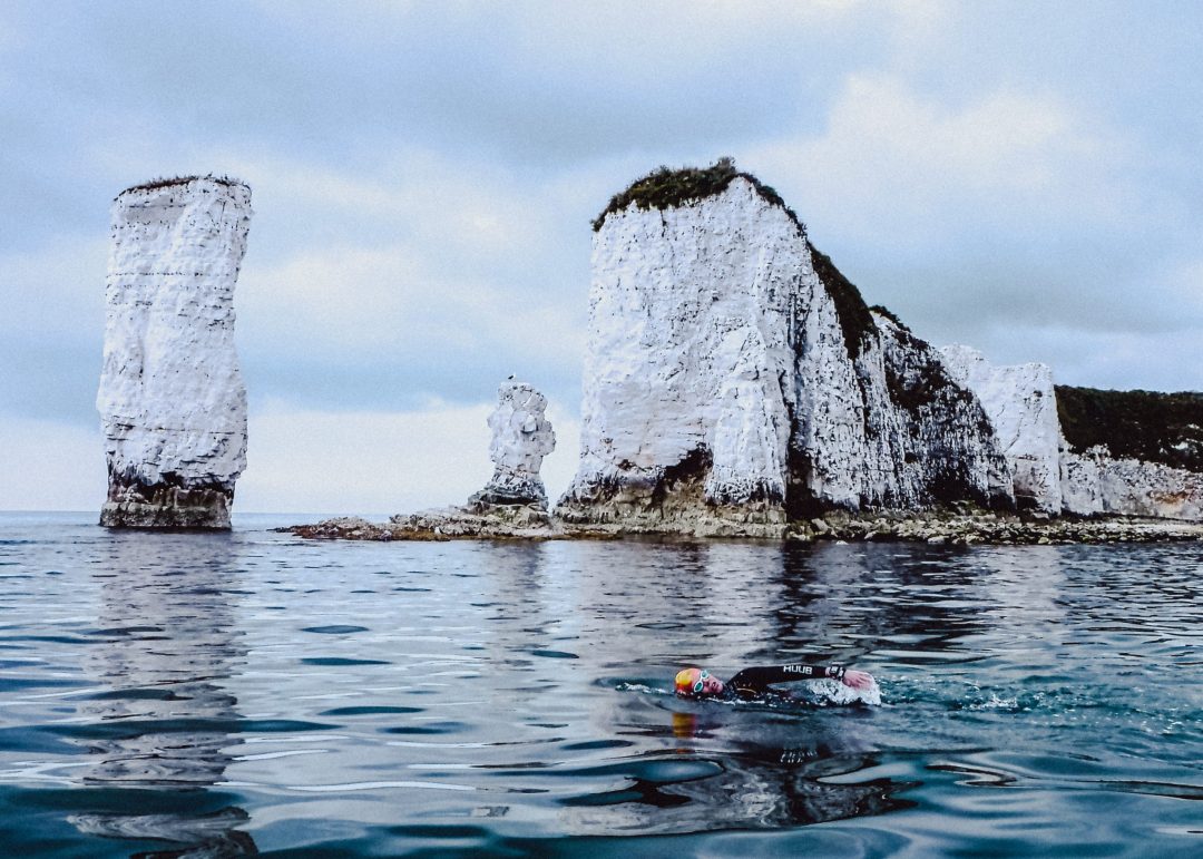 Claire Smith swims around Old Harry Rocks in the Isle of Purbeck, Dorset