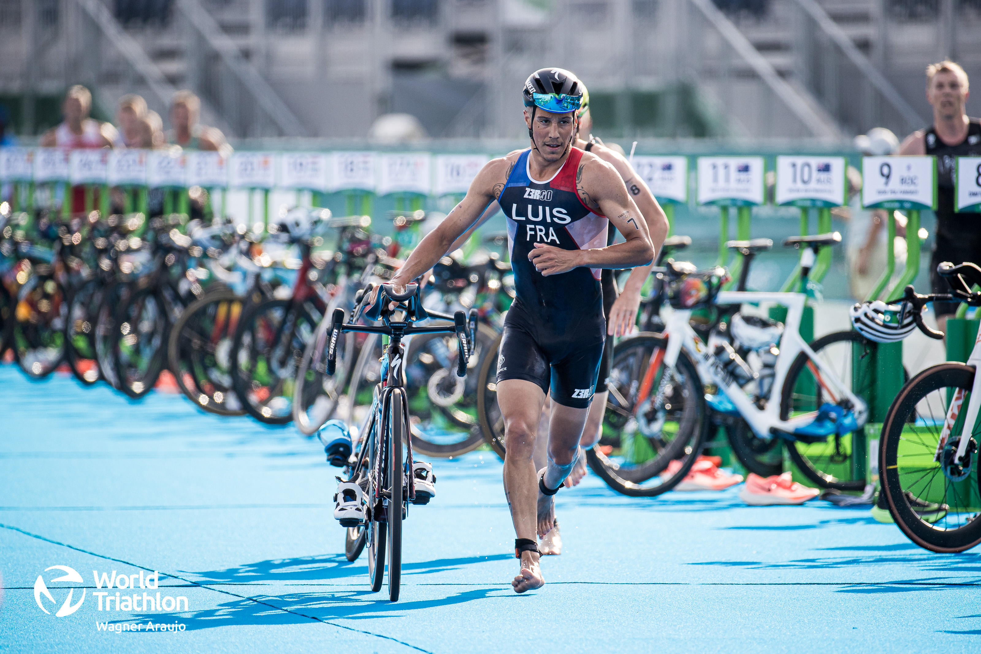 Vincent Luis leads the swim and is first into T1. 