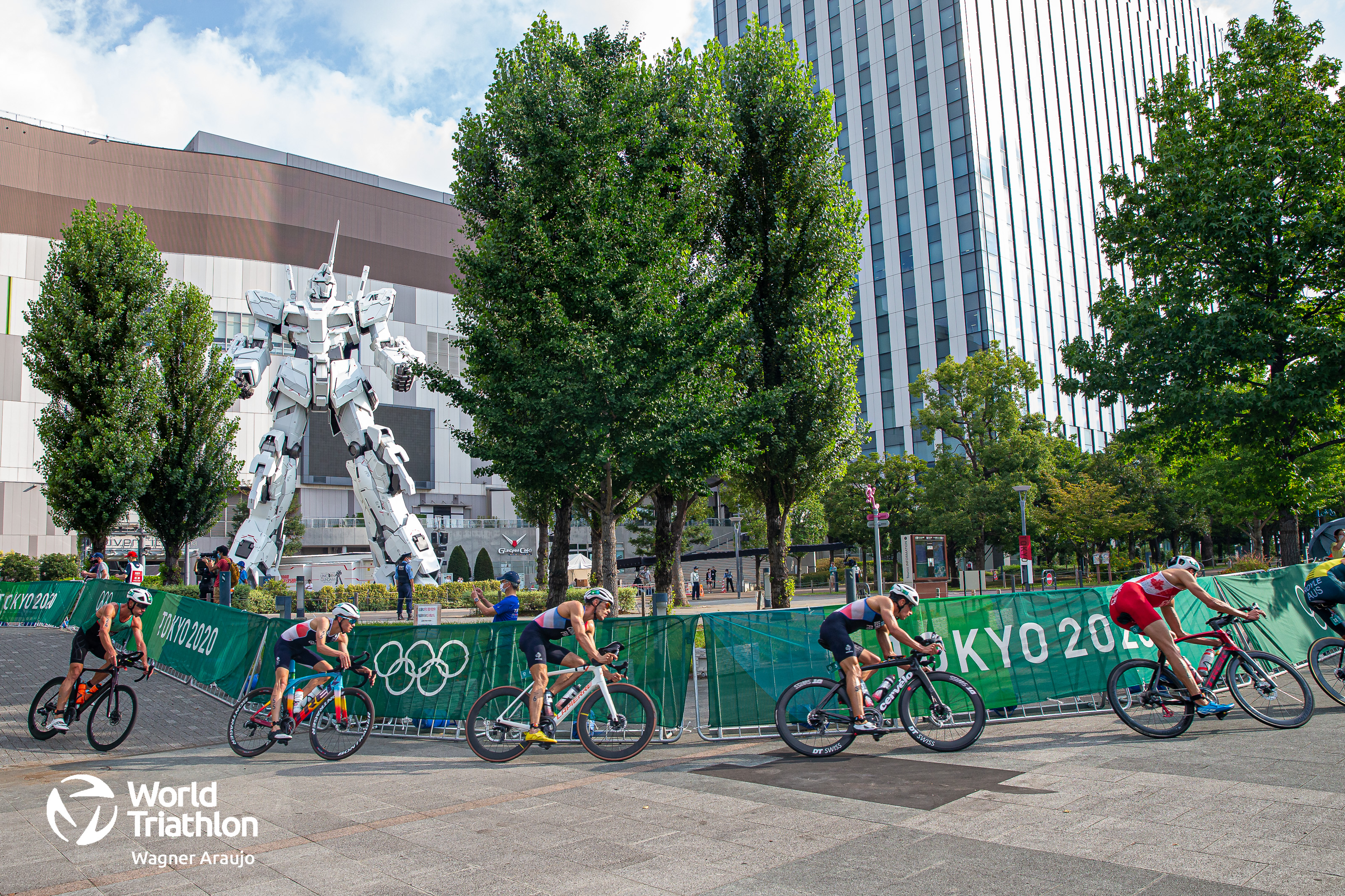 Futuristic sights greet the men along the course in Odaiba Park, Tokyo. 