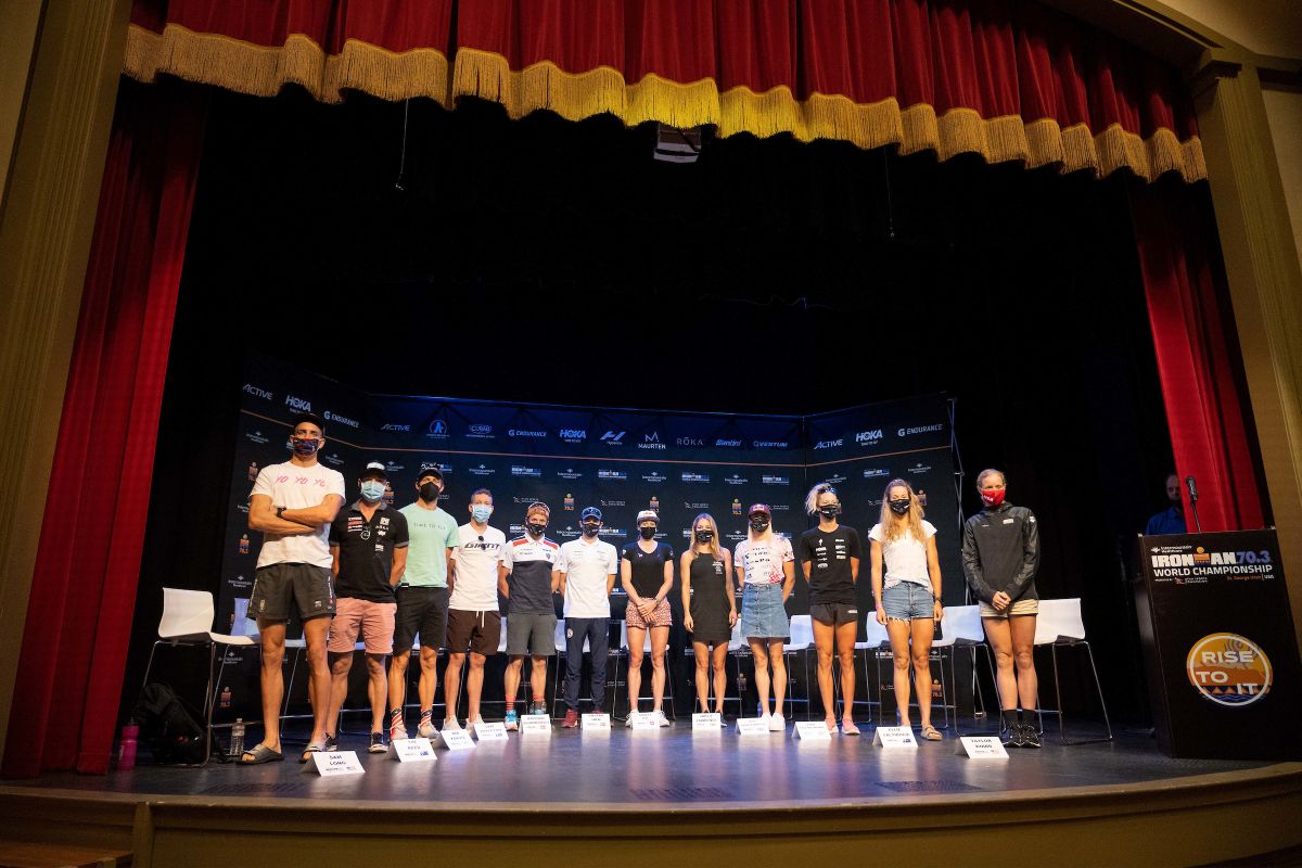 The top pros pose together for a photo ahead of race day