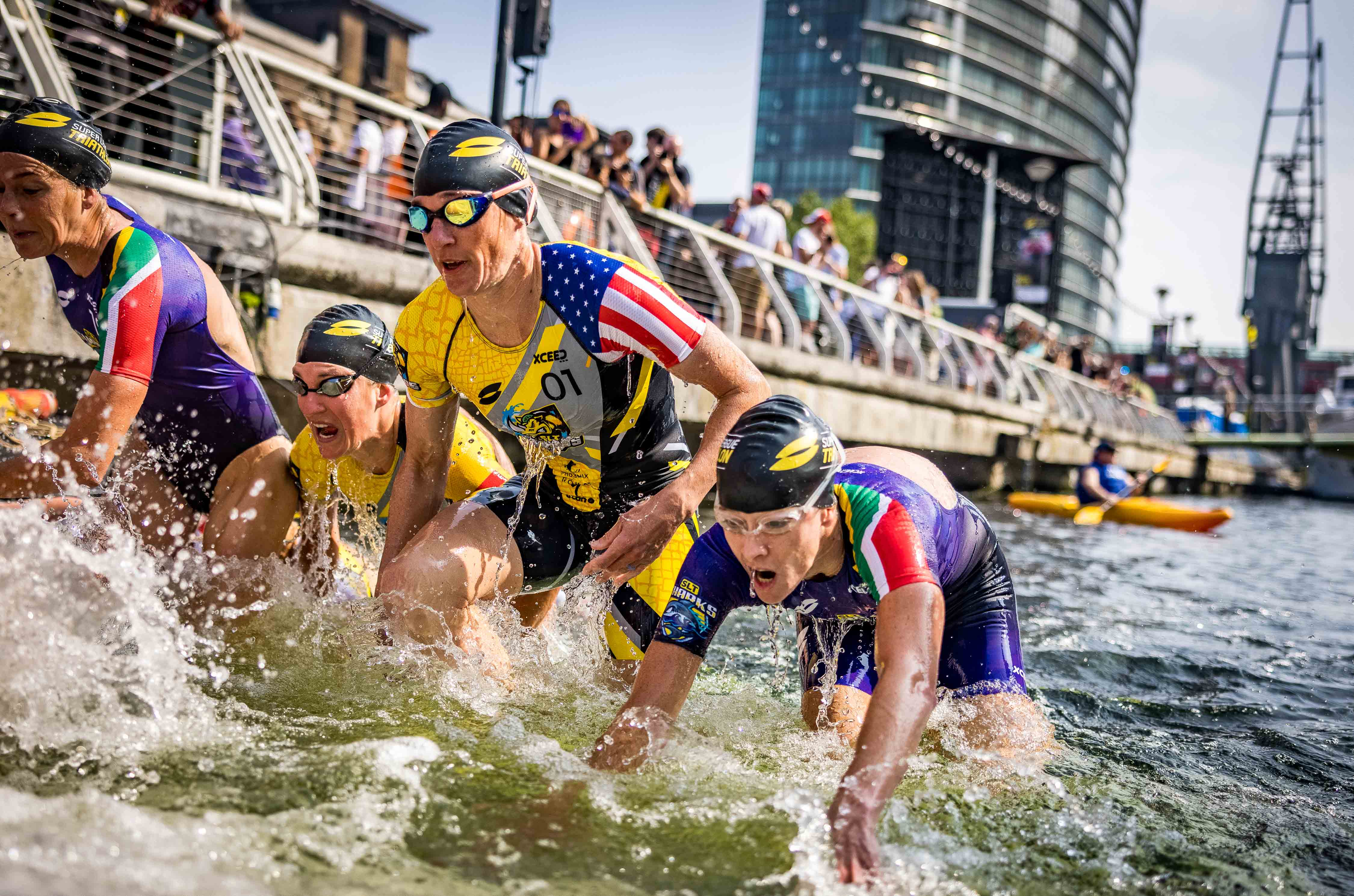 The women emerge from the swim as Super League Triathlon returns in London