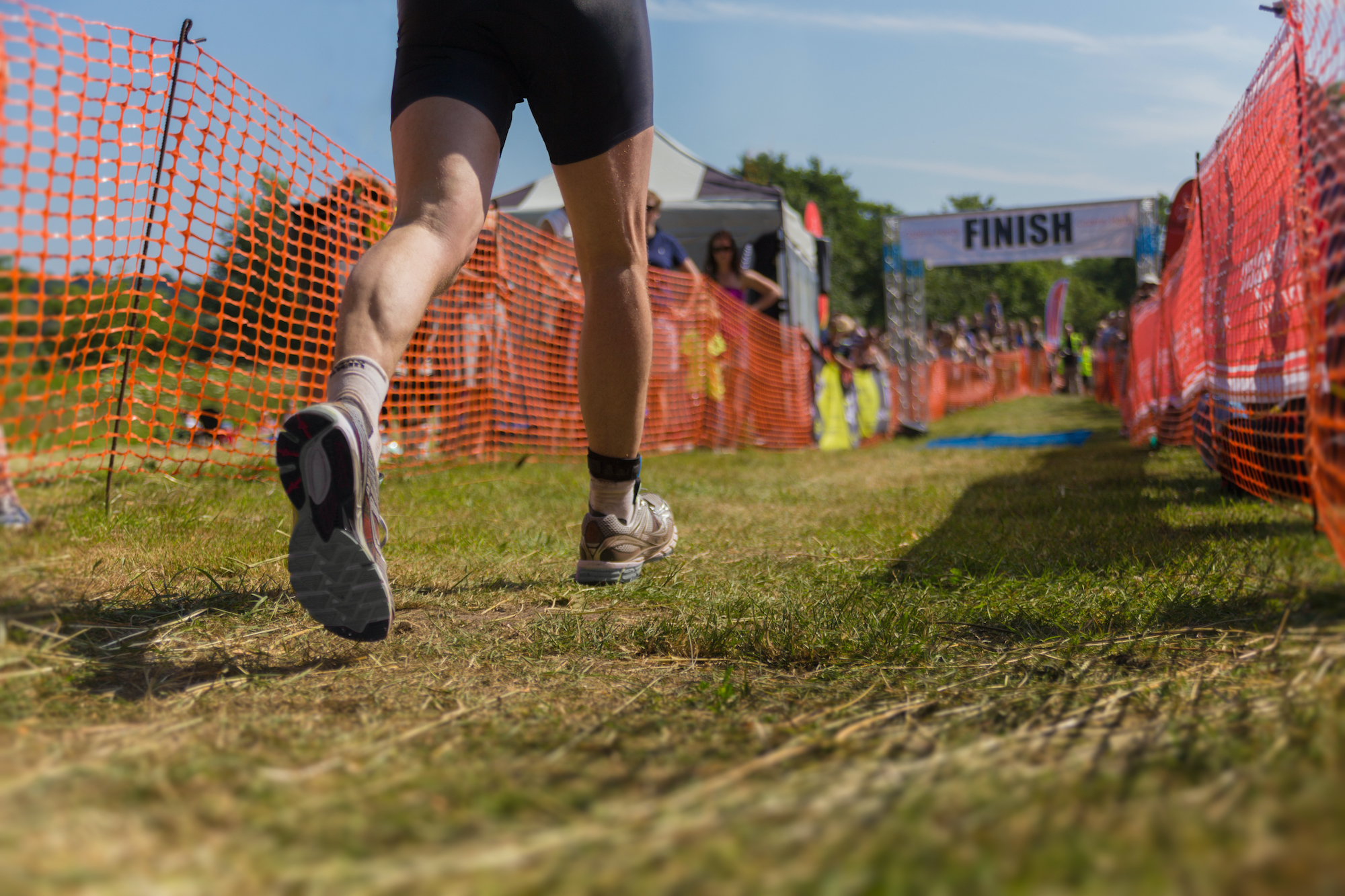 Triathlete racing toward the finish line