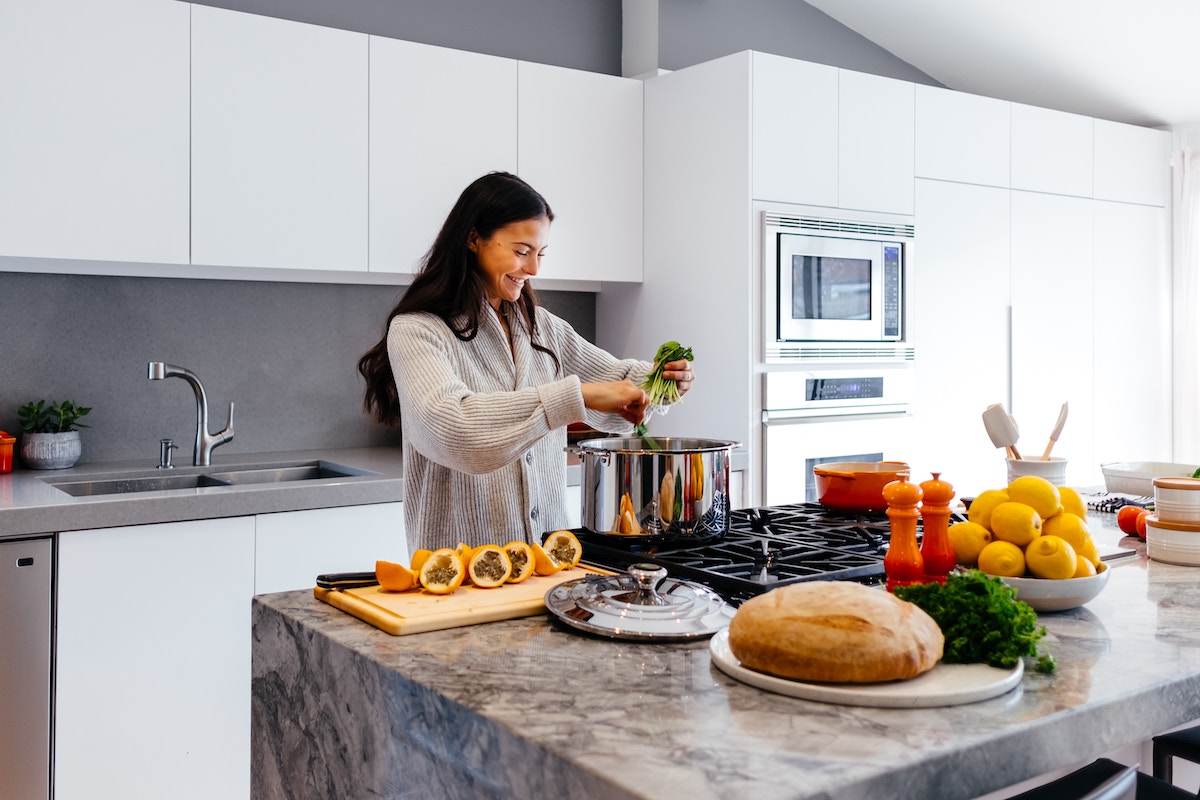 Woman cooking in kitchen