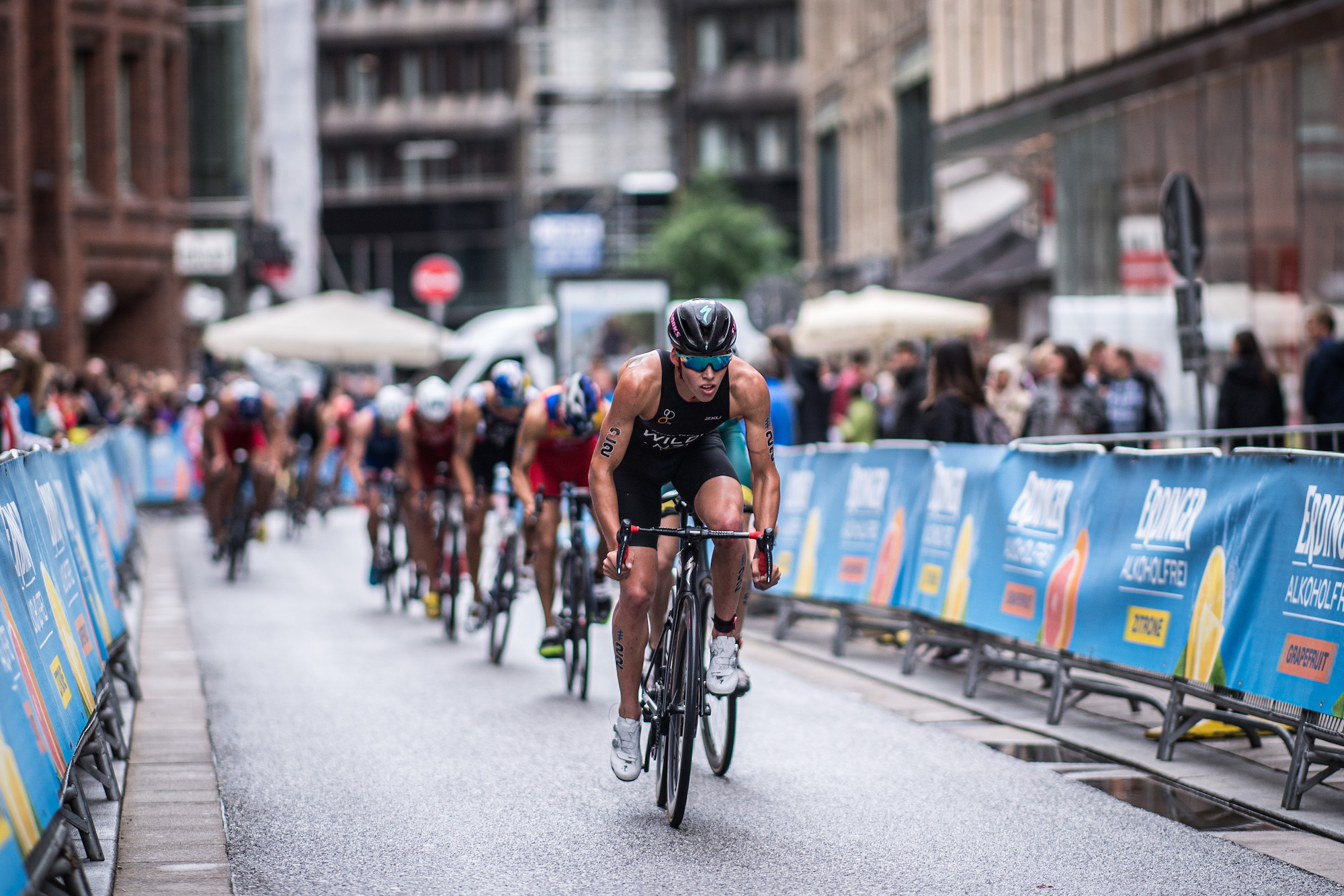 Hayden Wilde performs in the bike leg at the World Triathlon race in Hamburg in July 2019 (Credit: Lukas Schulze/Getty Images)