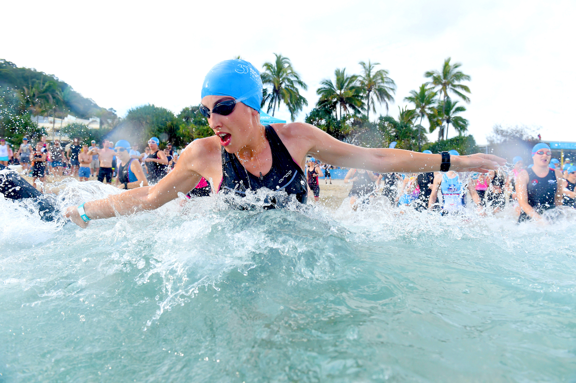 Triathletes begin the swim in the Noosa Triathlon in Australia