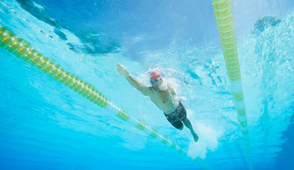 How to reduce excessive kicking when swimming | 220 Triathlon