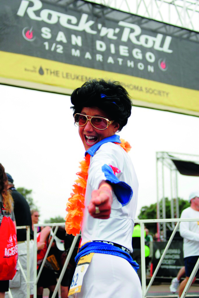 SAN DIEGO, CA - JUNE 03: 3-time Ironman World Champion Chrissie Wellington celebrates at the finish line after running in the Rock 'n' Roll Half Marathon on June 3, 2012 in San Diego, California. (Photo by Kent C. Horner/Getty Images) *** Local Caption *** Chrissie Wellington