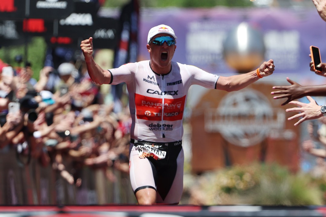 kristian blummenfelt crossing line of ironman world champs 2021