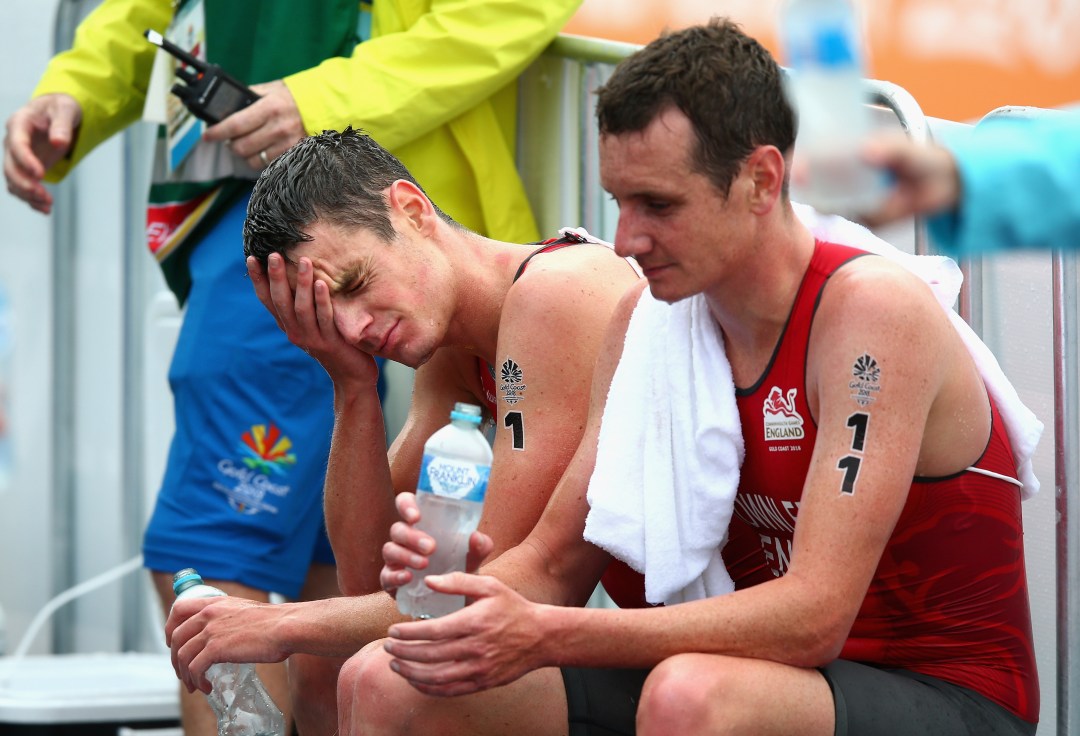 GOLD COAST, AUSTRALIA - APRIL 05: Jonathan Brownlee of England (1) and Alistair Brownlee of England (11) look dejected after the Men's Triathlon on day one of the Gold Coast 2018 Commonwealth Games at Southport Broadwater Parklands on April 5, 2018 on the Gold Coast, Australia. (Photo by Michael Dodge/Getty Images)