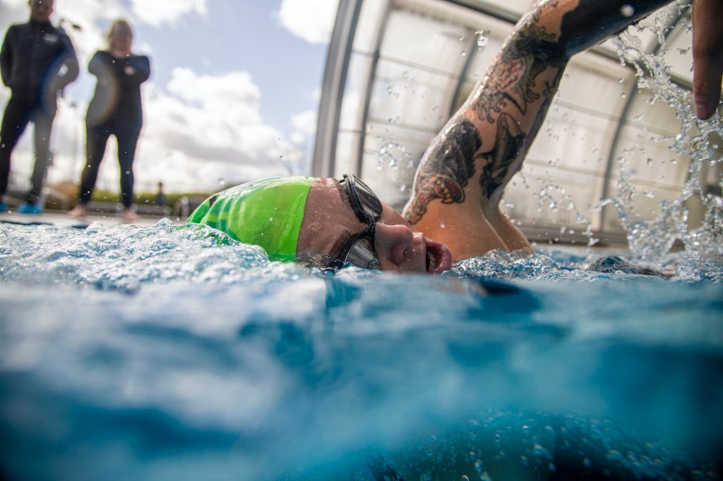 Swimming front crawl in a pool