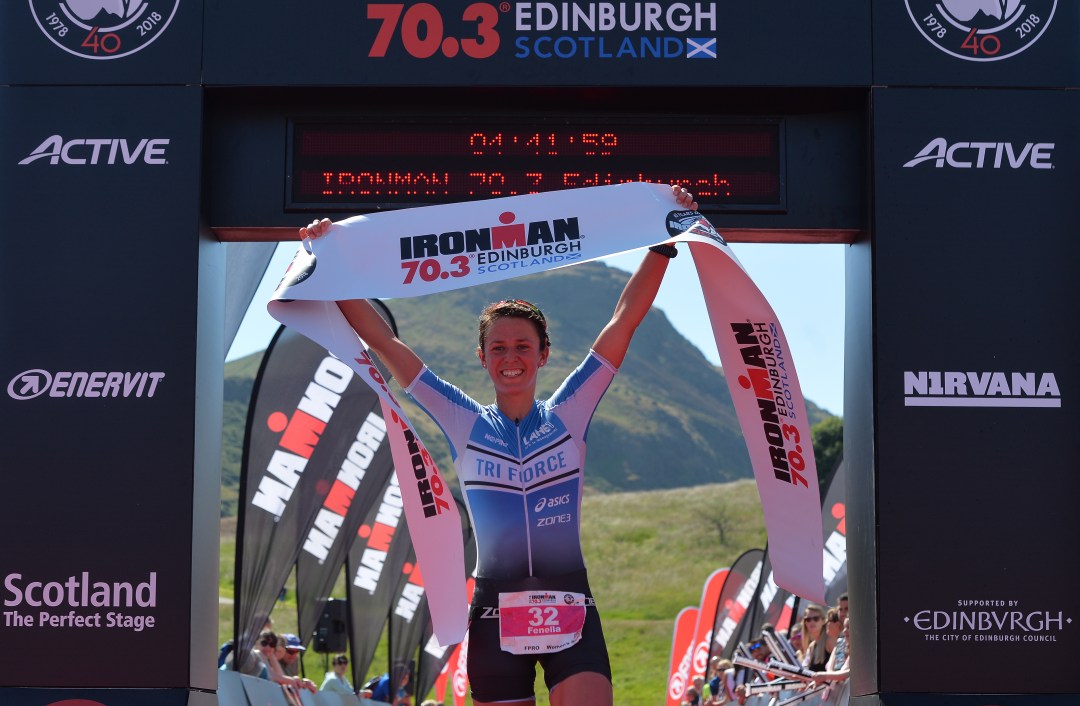 Fenella Langridge of Great Britain crosses the finish line to win the women's race during the IRONMAN 70.3 Edinburgh Triathlon on July 1, 2018 in Edinburgh, Scotland.