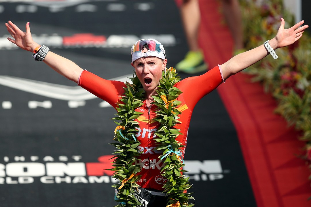 Chelsea Sodaro celebrates winning the Ironman World Championship in Kona