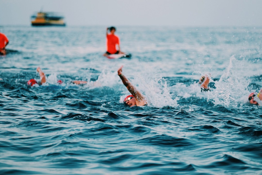 Athletes swimming at the Ironman World Championship in Kona