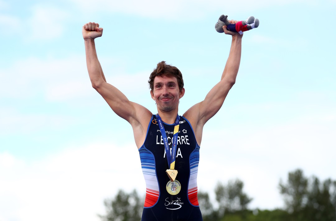 Pierre Le Corre of France celebrates with his Gold medal after the Men's Triathlon Final on Day Nine of the European Championships Glasgow 2018 at Strathclyde Country Park on August 10, 2018 in Glasgow, Scotland. This event forms part of the first multi-sport European Championships.