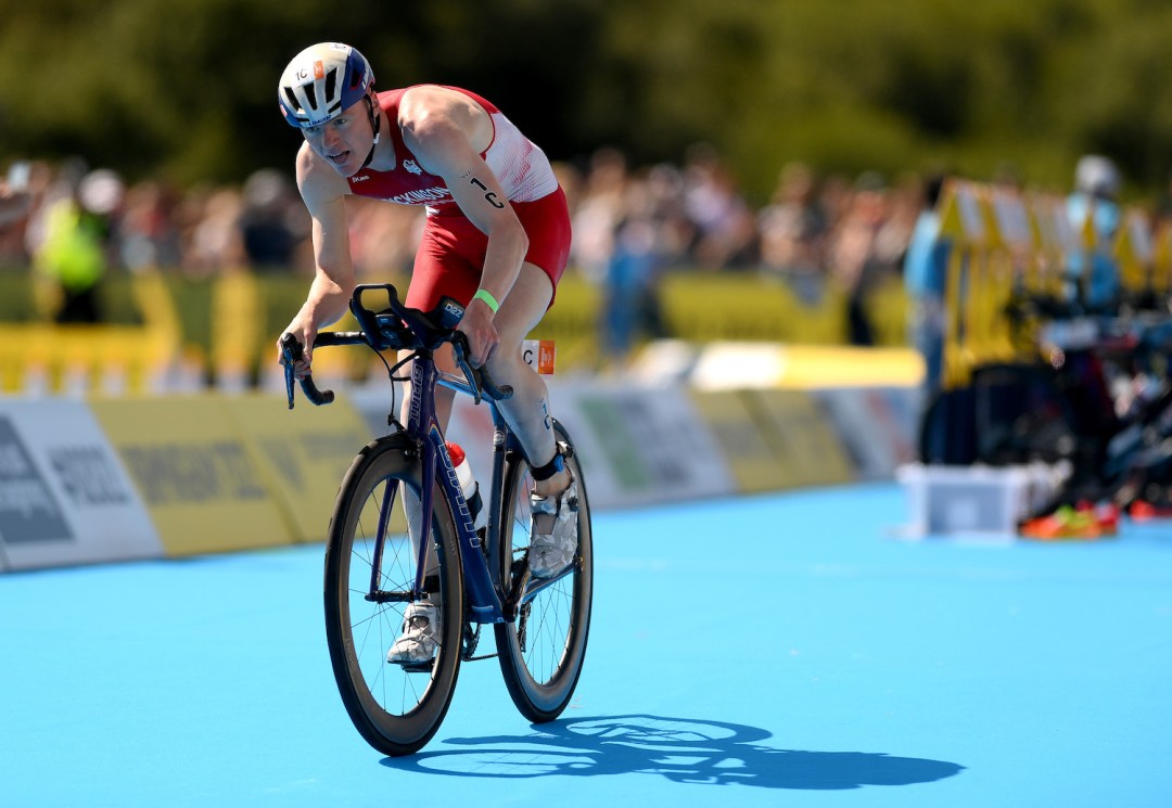 GB triathlete Samuel Dickinson competing at the 2022 Commonwealth Games Triathlon Mixed Team Relay Final