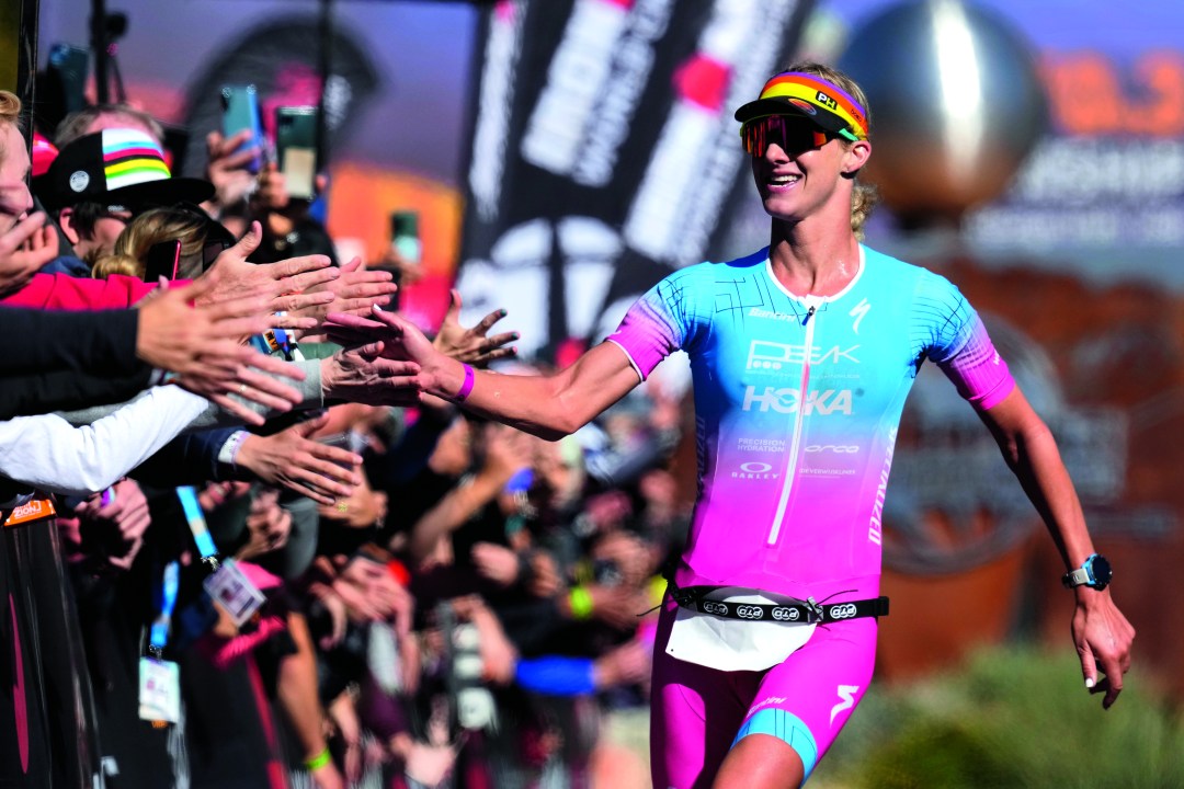Emma Pallant-Browne of Britain celebrates as she finishes third at the 2022 Ironman 70.3 World Championship in St George, Utah