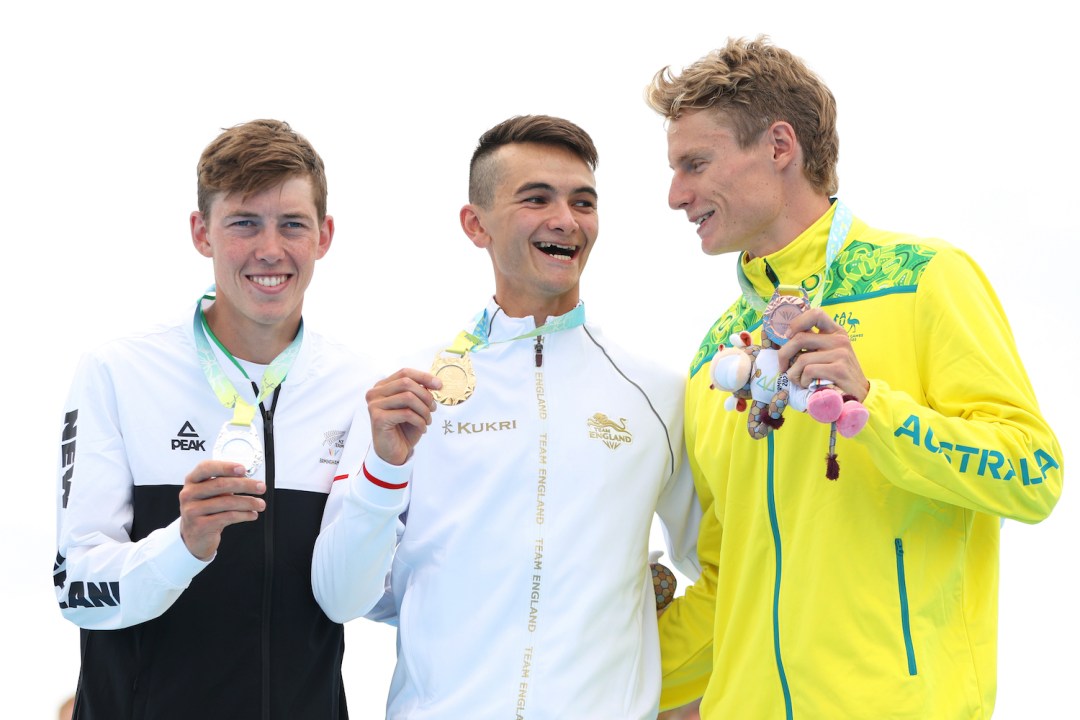 Hayden Wilde, Alex Yee and Matthew Hauser pose on the men's triathlon podium at the 2022 Commonwealth Games, in Birmingham, England