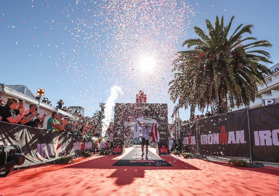 Lars Lomholt of Denmark reacts after winning Ironman Portugal Cascais on October 15, 2022