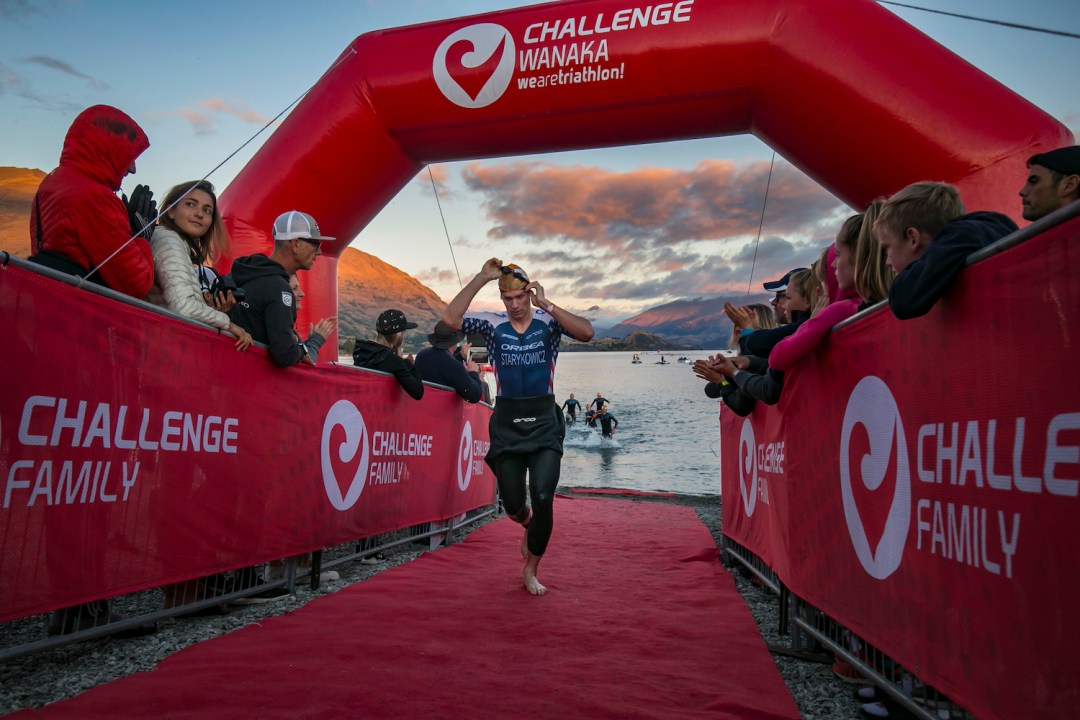 Triathlete exits the swim at Challenge Wanaka