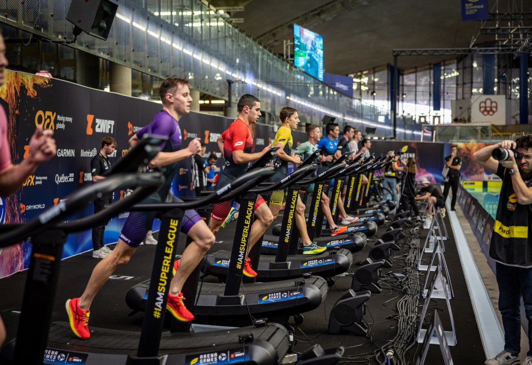 Male triathletes running on treadmills at the Arena Games Triathlon Montreal 2023