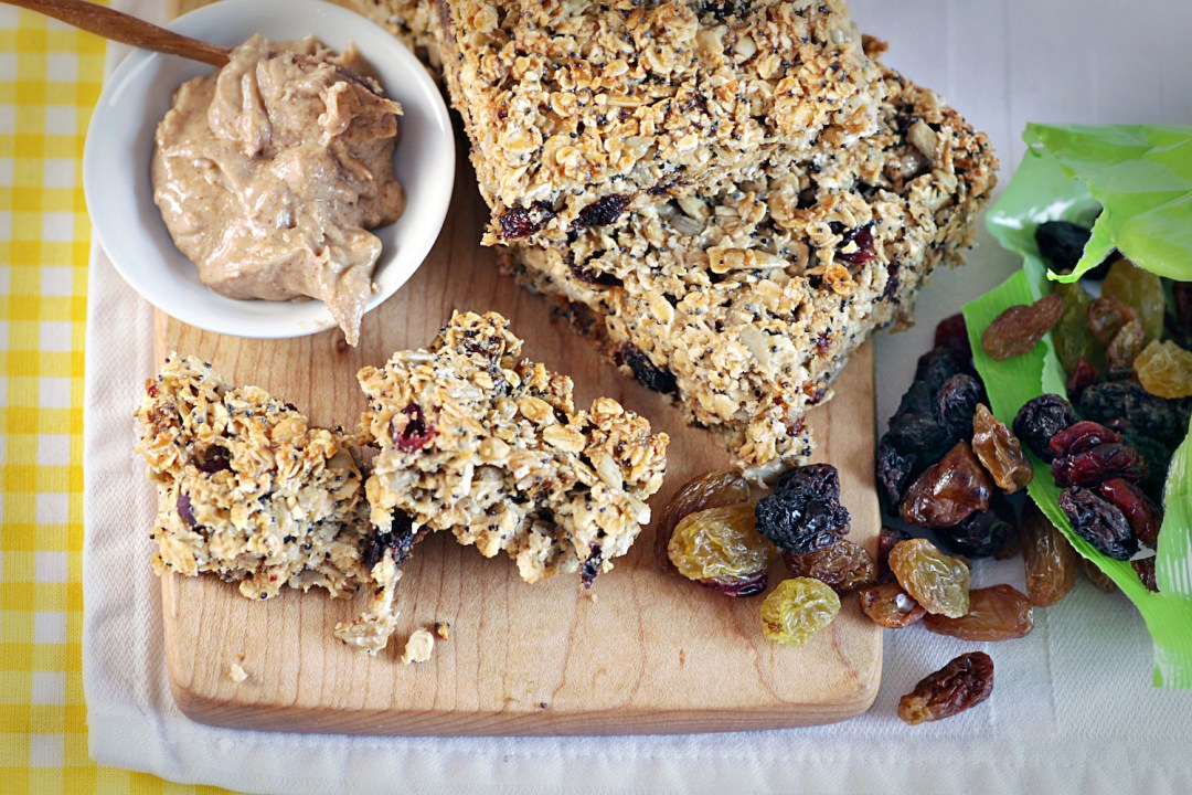 A close up of some homemade energy bar flapjacks plus ingredients