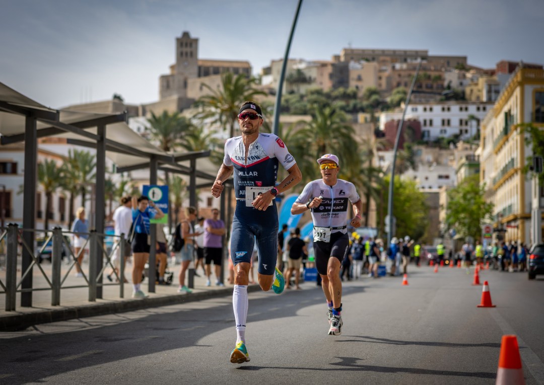 Jan Frodeno racing just ahead of Kristian Blummenfelt during the run leg of the PTO European Open in Ibiza, 5 May 2023.