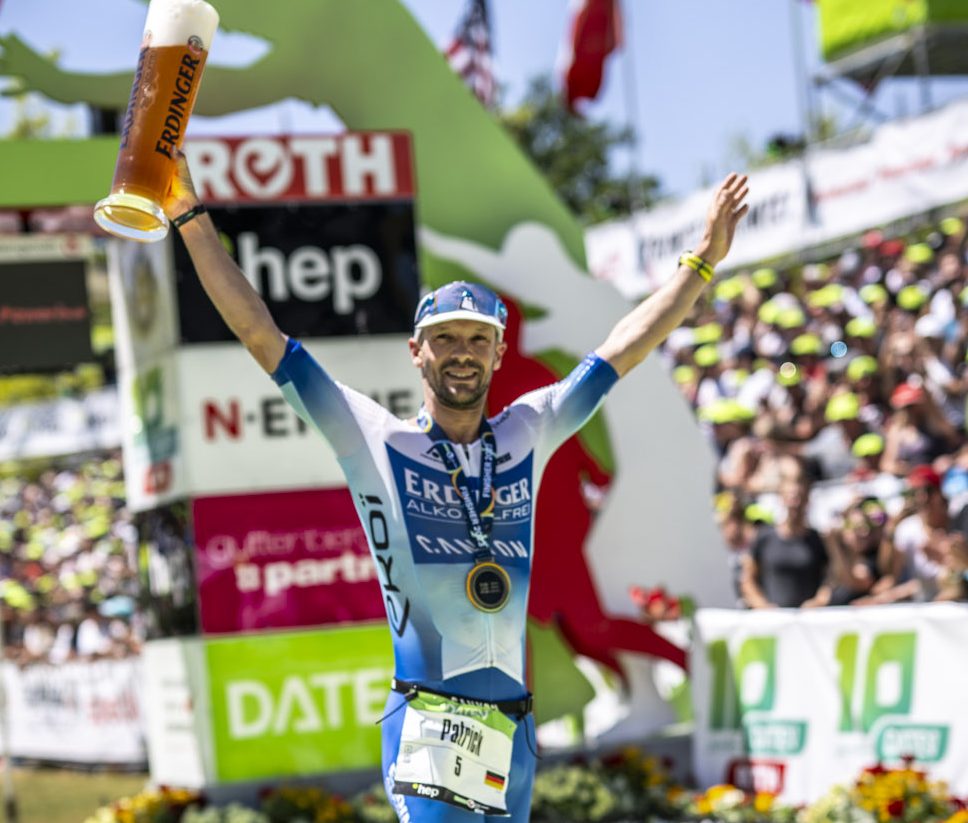 Patrick Lange celebrates finishing second at Challenge Roth