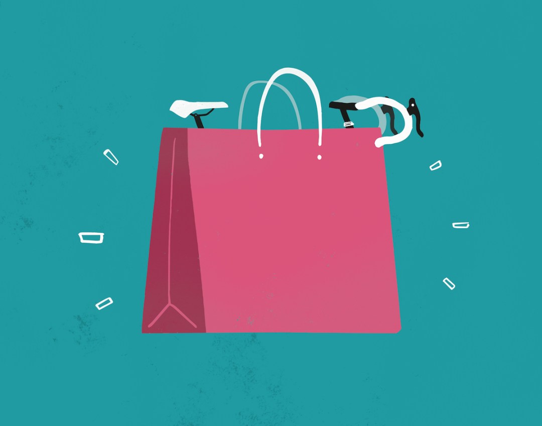 Illustration of a bike poking out of the top of a large shopping bag