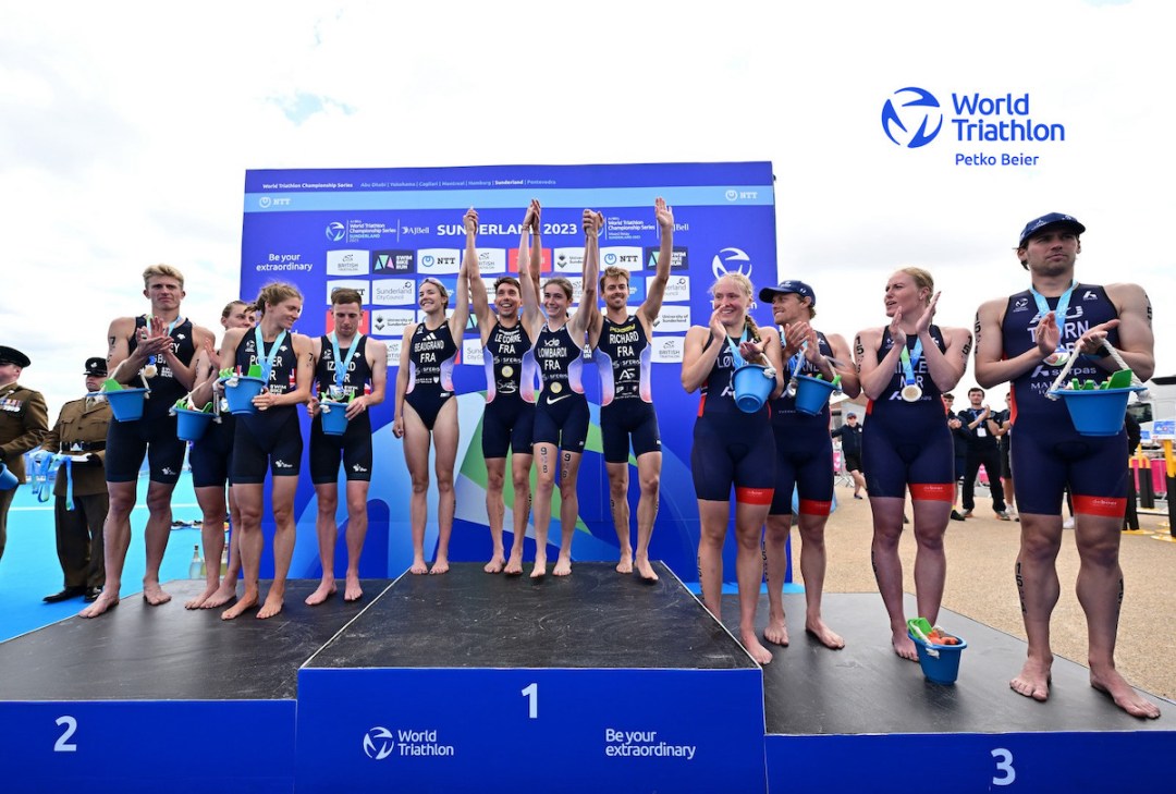 L-R: Team GB (silver), Team France (gold) and Team Norway (bronze) on the podium at the WTCS Sunderland mixed team relay event