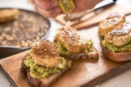 Sesame-crusted tofu on avo toast