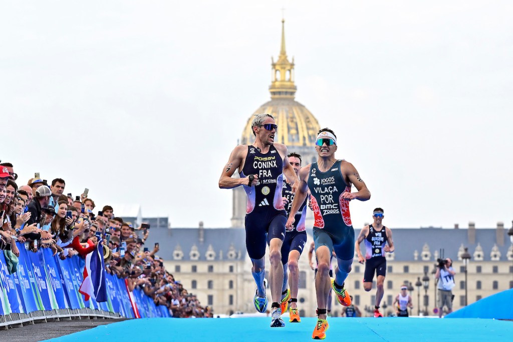 Dorian Coninx and Vasco Vilaca fight for second place at the men's Paris Olympics triathlon test event in August, 2023