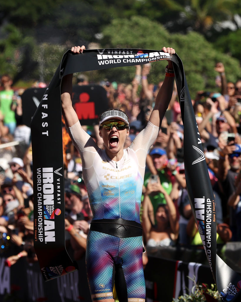 Lucy Charles-Barclay celebrates after winning the 2023 Ironman World Championship in Kailua Kona, Hawaii.