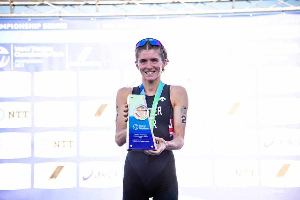 GB triathlete Beth Potter with her championship trophy for winning the 2023 World Triathlon Championship Series