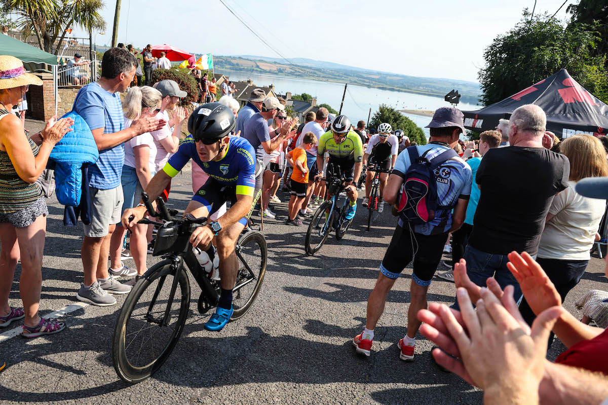 Competitors cycle uphill during Ironman Ireland