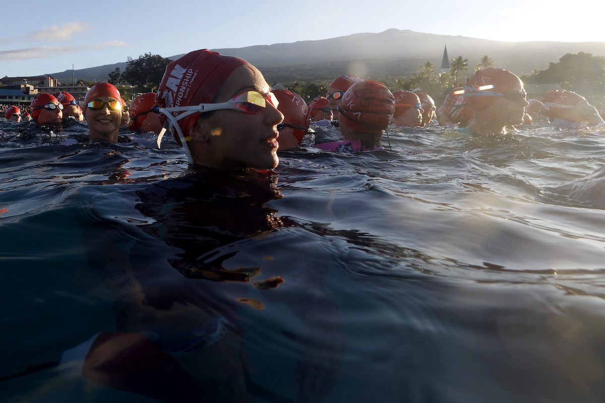 Age-group female athletes prepare to race the 2023 Ironman World Championship in Kailua Kona, Hawaii.