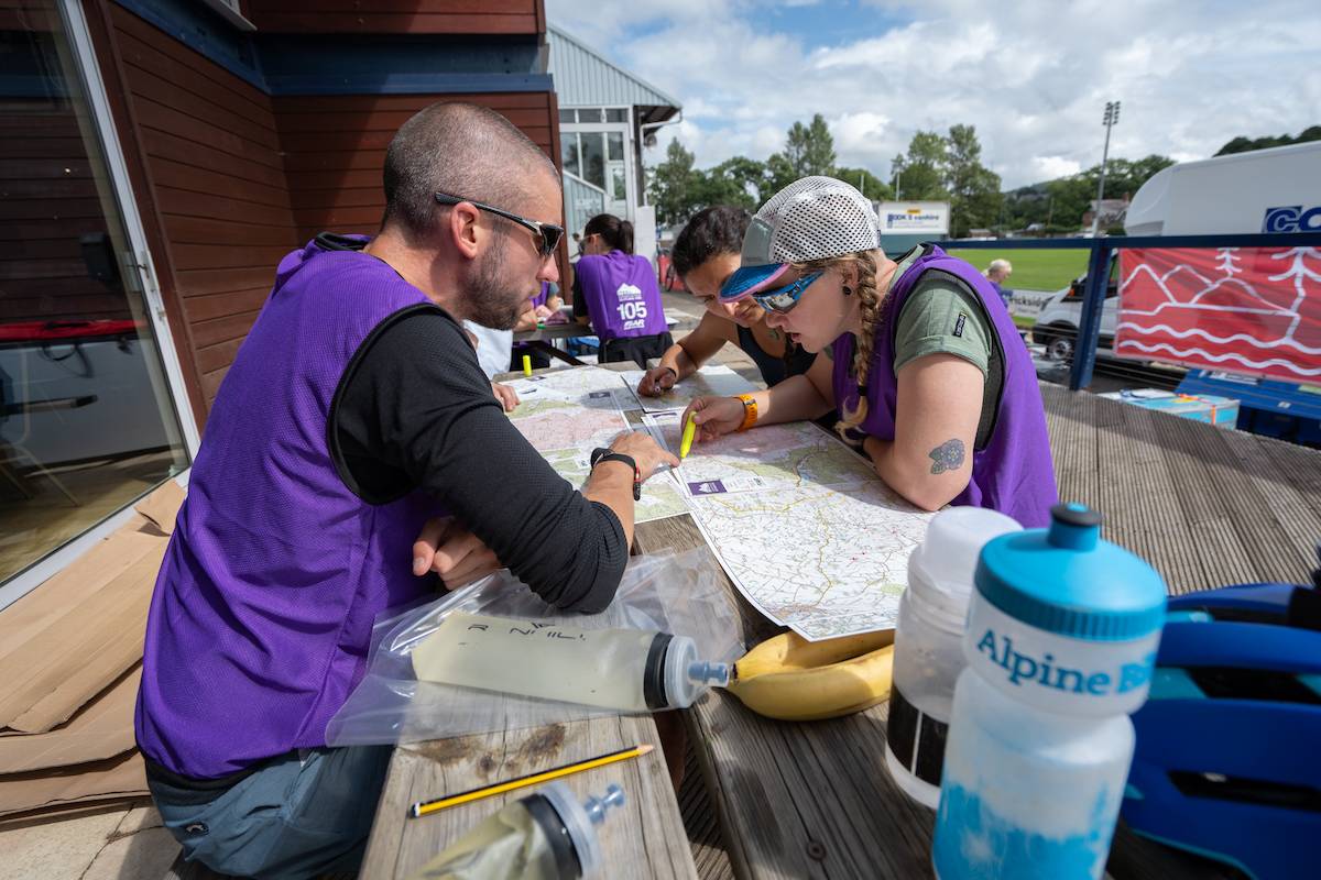 Competitors planning their course before the start of the Itera-lite 