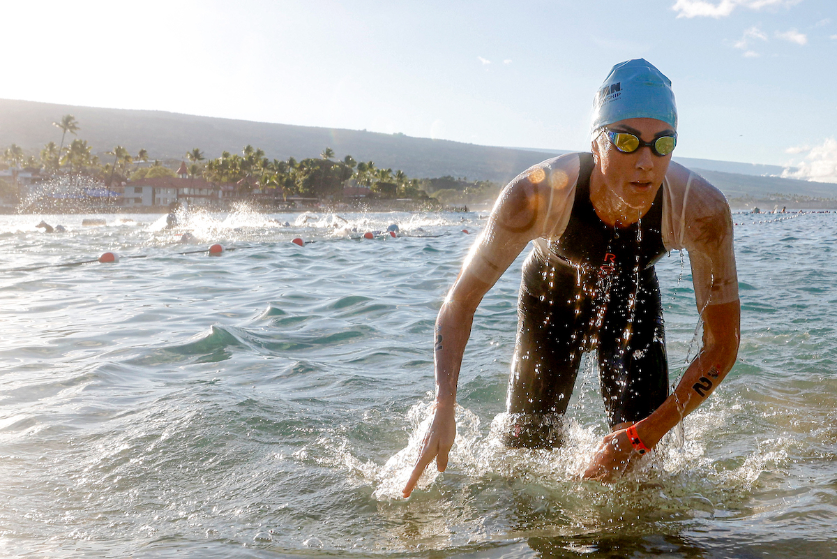 Lucy Charles-Barclay exits the swim in first place during the 2023 Ironman World Championship in Kailua Kona, Hawaii