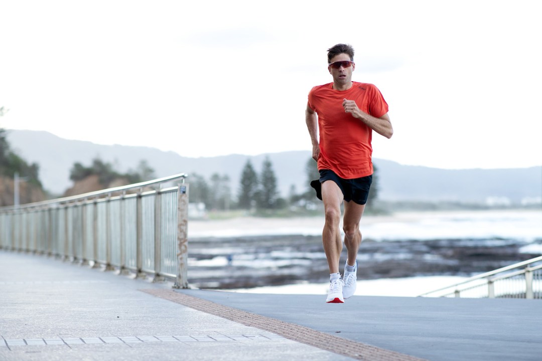 Australian triathlete Aaron Royle runs during a training session around Wollongong Harbour in 2020